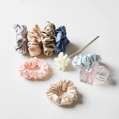 China Hair Decoration 1.5CM 50 PCS Tie Assorted Colors Solid Color Silk Scrunchies Elastic Hair Band For Gift for sale