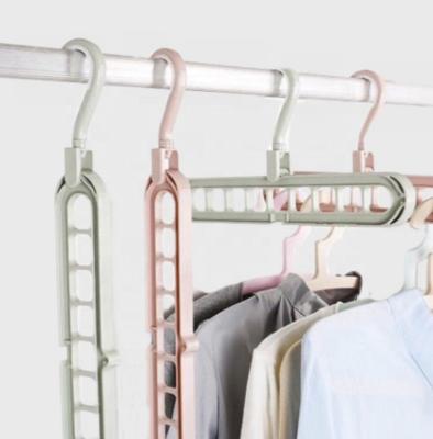 China Sustainable Hot Amazon 9 in 1 Plastic Folding Hanger Closet Space Saving Storage Folding Home Rack for sale