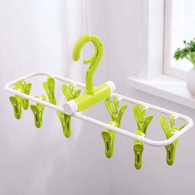 China Minimalist Blue Green Plastic Garment Hanger 12clips Pink Panty Hanger Plastic Socks Holders for sale