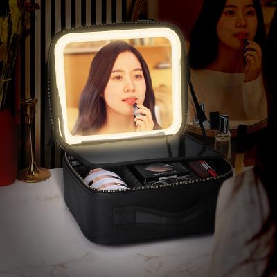 China Fashion New Arrival Cosmetic Bag with Mirror and Lights PU Leather Makeup Bag with Large Normal Mirror LED Adjustable Lights for sale