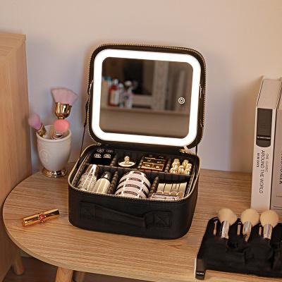 China Full-Page Fashion Travel Large Capacity Function With Sufficiency Light Organizer Pu Makeup Case Brush Box Storage Mirror Led Portable Bag for sale