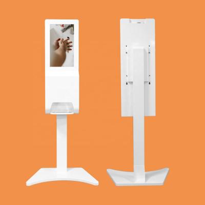 China Indoor Advertising Equipment With Foam Spray Gel Hand Sanitizer Dispenser Automatic Advertising Kiosk Stands for sale