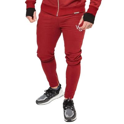 China Anti-wrinkle factory custom logo fashion muscle sports running outdoor fitness pants men tight straight leg pants for sale