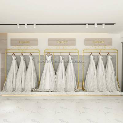 China Modern Customized High-end Bridal Wedding Dress Store Landing Exhibit Gold Silver Suit Dress Shop Display Racks Stands for sale