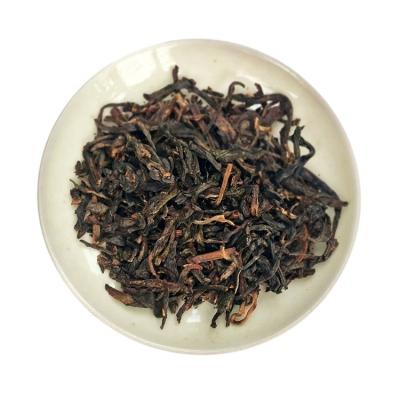 China 2009 Multifunctional Compressed Tea New Arrival Year Tree Compressed Healthy Herbal Pu Erh Tea From Yunnan for sale