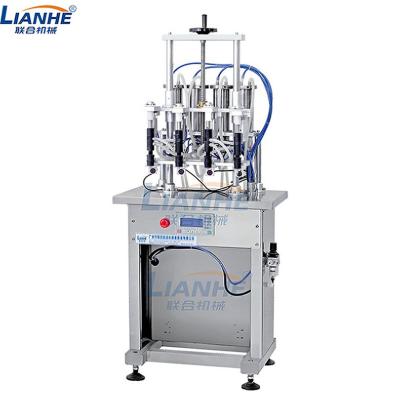 China Mall Perfume Glass Chemical Bottles Filling 4 Filling Nozzles Perfume Equipment / Oil Essential Oil Filling Machine for sale