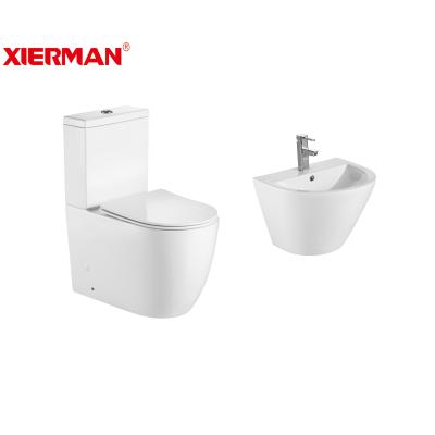 China Double-flow Top Sale Modern Bathroom Rimless Toilet Ceramic Two Piece Toilet Bowl with Geberit for sale