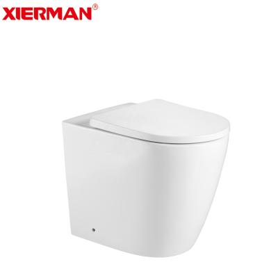 China Brand New UK Factory Price Double-flush Ceramic Rimless Toilet Hidden Tank Back To Wall Floor Pan Toilet Seats for sale