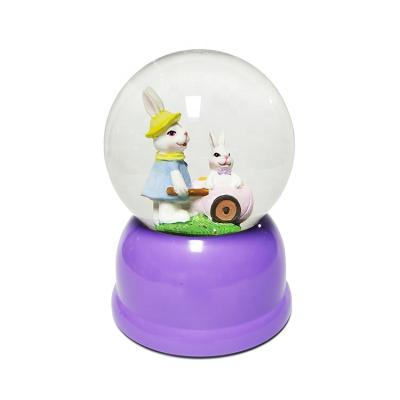 China Europe Light Twinkle Led Swirl Spring Decoration Indoor Rabbit Easter Water Snow Globe for sale