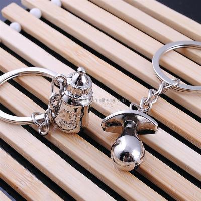 China Ywbeyond Metal Baby Shower Memories Baby Bottle Love Couples Key Chains Key Chains for sale