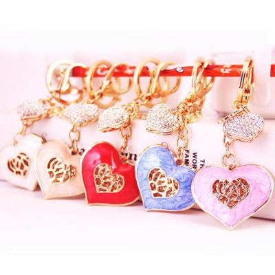 China Ywbeyond Valentines Gifts Metal Pinch Charm Rhinestone Key Chain Crystal Crown Heart Keyring For Car Purse Pendant Holder for sale