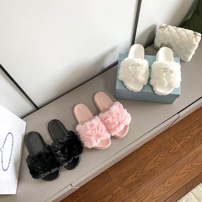 China Designer Brand Fashion Famous Women's Pink Fluffy Luxury Ladies Slides Original Leather Fur Fuzzy Plush Winter White Black Slippers for sale