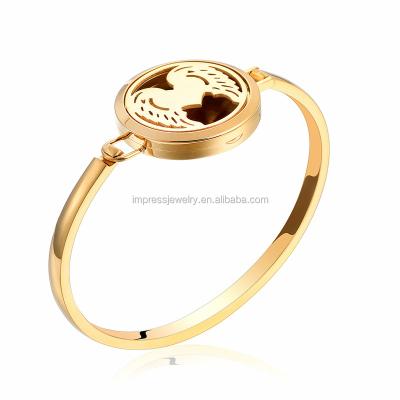 China Classic Angel Wings Accessories Women Gold Diffuser Bracelet Hollow Essential Oil Aroma Bangle&Bracelet for sale