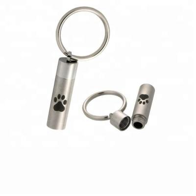 China Engrave IJK2001 Cut Out Dog Paw Print Cylinder Stainless Steel Cremation Urn Key Ring For Memorial Pet Key Chain Hold Ashes for sale