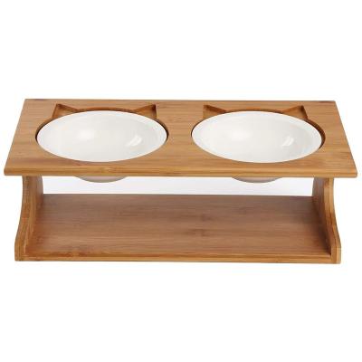 China Dog Cat Feeder Raised Tilted Platform Sustainable Elevated Wooden Pet Feeder With 2 Ceramic Bowls for sale