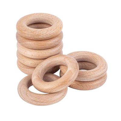 China Eco Friendly And Safe Wholesale Handmade Natural Circle Wooden Teether Ring For Children for sale