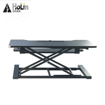 China Adjustable (Height) Sit To Stand Black Gas Lift Height Adjustable Stand Up Desk Sit Converter for sale