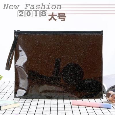 China Hot Selling Waterproof Colorful PVC Plastic Cosmetic Bag Holographic Black Makeup Packaging Bag for sale