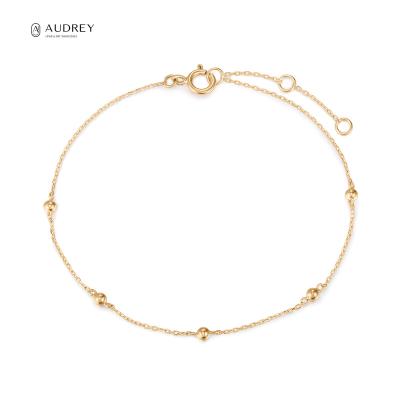 China Audrey Wholesale Charm Fine Jewelry Bangle Trendy Solid Gold Round Ball Globe Bracelet Environmentally Friendly Jewelry 14K Gold for sale