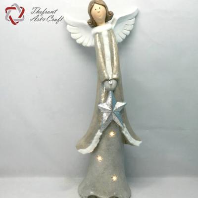 China Crafts Angel Figurine China Supplier LED Light Paper Mache Wing Christmas Decor Angel With Star for sale