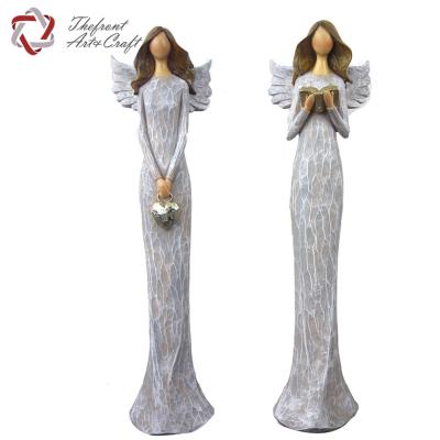 China Polyresin angel figurine for woodcut polyresin angel standing statues in garden decoration home decoration figurines with wing for sale