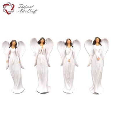 China Wholesale Woodcut Polyresin Standing White Angel Figurine in Polyresin Angel Figurine China Manufacturer for sale