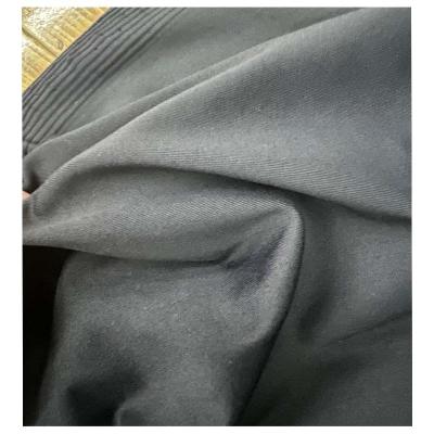 China High Stretch Elasticity Shrink Wholesale Price DTY Resistant Soft Sportswear Fabric Matte Spandex Solid Knit Fabric for sale