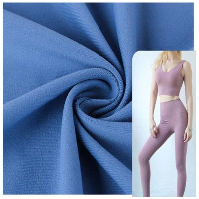 China High Stretch Elasticity Shrink Wholesale Price DTY Resistant Soft Sportswear Fabric Matte Spandex Solid Knit Fabric for sale