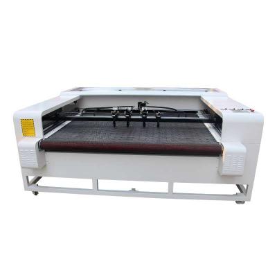 China Water Cooled Fast Speed ​​Cutting Table Apparel Leather Fabric Automatic CO2 Laser Cutting Machine for sale