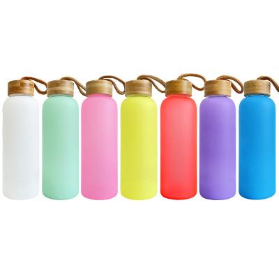 China Hot Sale Wholesale Viable 500ml 750ml Sublimation Frosted Mixed Color Ombre Sports Glass Water Bottle With Bamboo Lid for sale