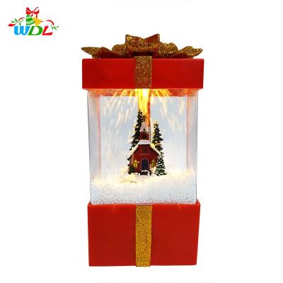 China Gift & Christmas Decoration Wholesale Christmas Decoration Supplies Christmas Village Resin Houses Inside Luxury Custom Red Lantern Snow Globe For Christmas Gift for sale