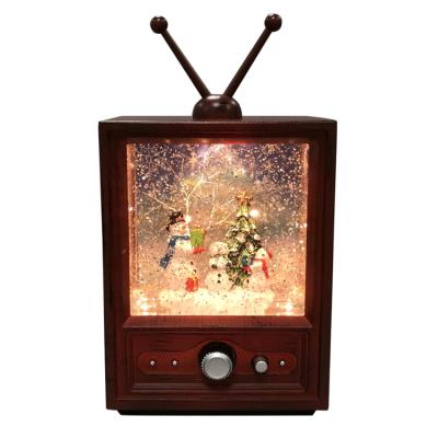 China Gift & Unique Christmas Decoration Melody Merry Christmas OEM Led Retro TV Snow Ball Style Water Spinning Christmas Lantern Snow Globe With Snowman Design for sale