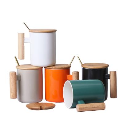 China 2021 Hot Selling Viable Porcelain Mug Bamboo Lid Ceramic Mug With Lid And Spoon Wood Handle Ceramic Coffee Mug for sale