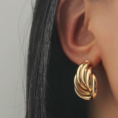 China New TRENDY Twist Earrings Shape Personality Geometric Creative Exaggerated Metal Earrings for sale