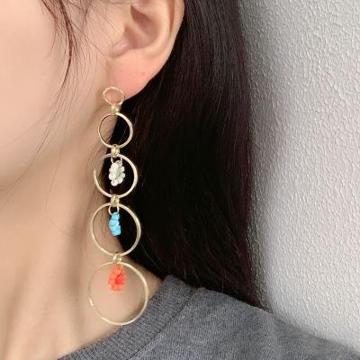 China Trendy new fashion creative multi-layer large circle dangle earring rice pearl flower retro geometric earrings for sale