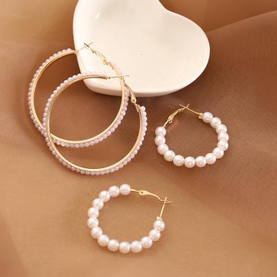 China Fashion CLASSIC personality big pearl circle earrings round circle pearl earrings women jewelry for sale