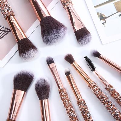 China Angular Blush Rose Gold Glitter Handle 10pcs Diamond Base Makeup Crystal Brushes With PU Bag Set Brush Professional for sale