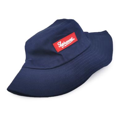 China Comfortable Economical China Made Logo Fishing Cap In Cotton Dark Blue Custom Bucket Hat For Women Mens for sale