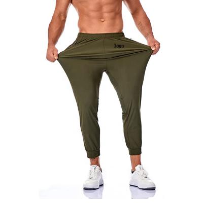 China 2021 Hot Sale QUICK DRY Men's Treads Comfortable Lightweight Sport Plus Workout Rise Waist Running Pants Gym Exercising Sweatpants for sale