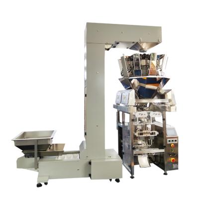 China Full Automatic Food Chain Bucket Packaging Equipment Tilting Chain Bucket Packaging Machine for sale