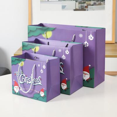 China Recyclable Wholesale Custom Color  Holiday Portable Christmas Paper Kraft  Packaging Shopping Bags for sale