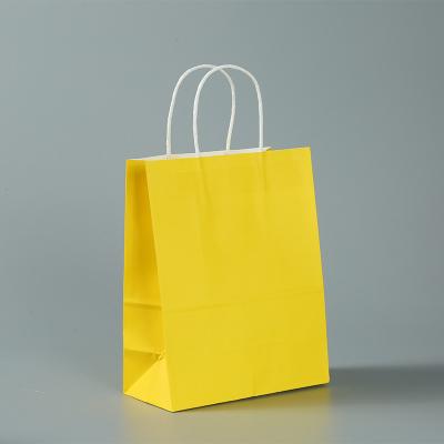 China Recyclable Wholesale Custom Color  Portable  Paper Kraft Bag Packaging Shopping Bags for sale