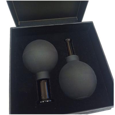 China Suction Glass Cupping Set Of 2pcs Chinese Cupping Facial Massage And Massage Silicone Cupping Therapy Set for sale