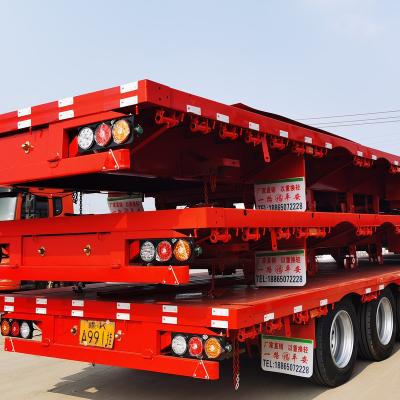 中国 Hydraulic Low Boy low bed trailer 100 ton Lowboy Semi Trailer Truck 40 feet flatbed truck trailer 販売のため