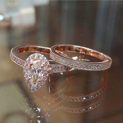 China Romantic Fashion Rose Gold Plated New Design 2pcs CZ Women Engagement Wedding Ring Set for sale