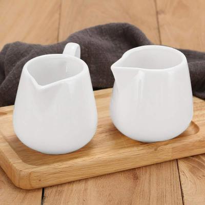 China Wholesale Modern Modern White Ceramic Jug Decorative Small Milk Jug Decorative Milk Pitcher for sale