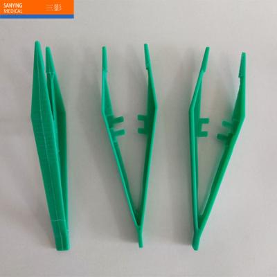 China Green Color Medical Surgical Disposable Medical Clamp Plastic Forceps for sale