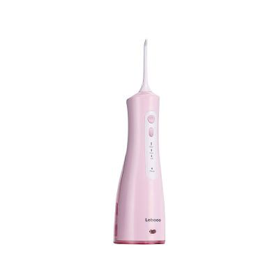 China Outdoor High Quality Portable Oral Dental Irrigator Pink Color Large Capacity Battery Travel Water Flosser for sale