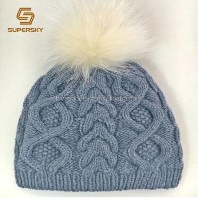 China COMMON T125-1 Women Thick Cable Knit Beanie Hat With Soft Faux Fur Pom Pom for sale