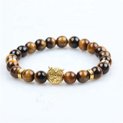 China FASHIONABLE high quality products women rose gold owl bracelet 8mm natural red stone custom bracelet for sale